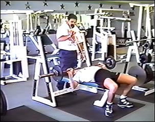 Rich Peters checks bar path with a stick
